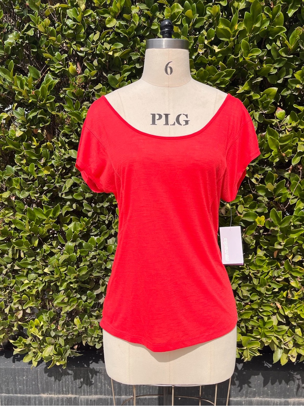 NWT Marika top with criss-cross feature - Size S